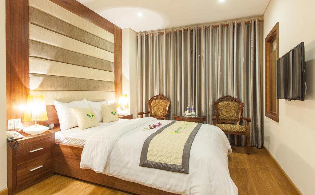 Phòng Giường đôi Deluxe (2 Người lớn + 1 Trẻ em)
